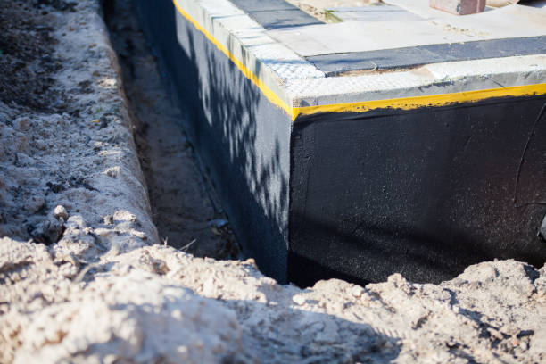 Professional Basement Waterproofing technician working in Rutherford, PA